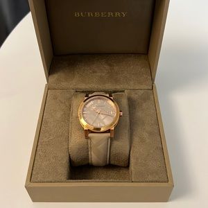 Rose gold and tan Burberry watch with leather strap
